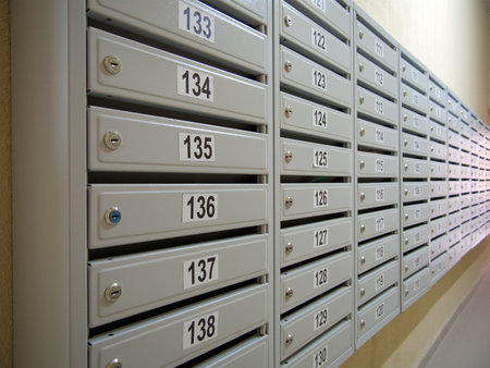 A row of new mailboxes on the porch wallの写真素材