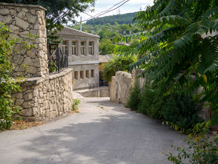 Bahchisaraj, Russia - September 18, 2020: Beginning of Oktyabrskaya street, city of Bakhchisarai, Crimeaのeditorial素材