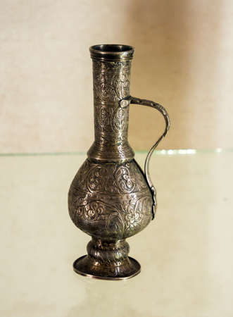 Bahchisaraj, Russia - September 18, 2020: Surakhi is a small bronze decanter.のeditorial素材