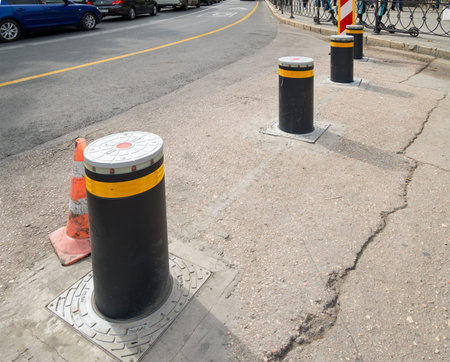 Sevastopol, Crimea - September 19, 2020: Road bollard in the form of retractable metal posts