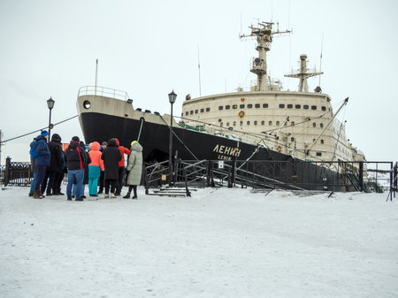 Murmansk, Russia - February 27, 2022: Gathering of tourists at the side of the ship of the museum "Nuclear icebreaker "Lenin"のeditorial素材