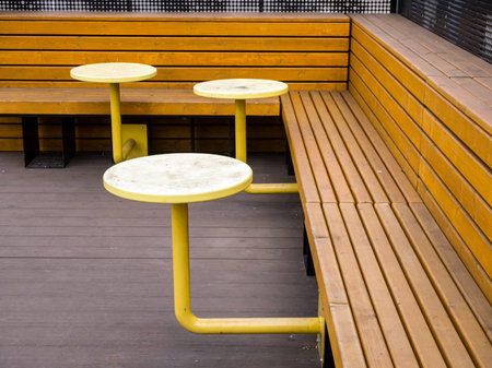 Bench with tables fixed on the console