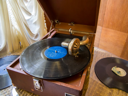 Sochi, Russia - February 12, 2023: Vintage mechanical gramophone with gramophone recordのeditorial素材