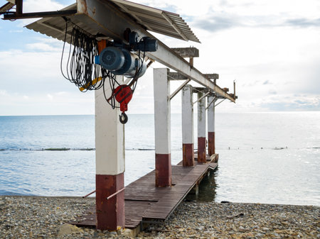Pier with electric winch for lifting boatsの写真素材