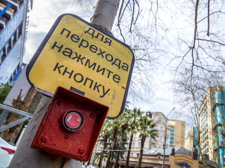 Button for crossing the street at a traffic light