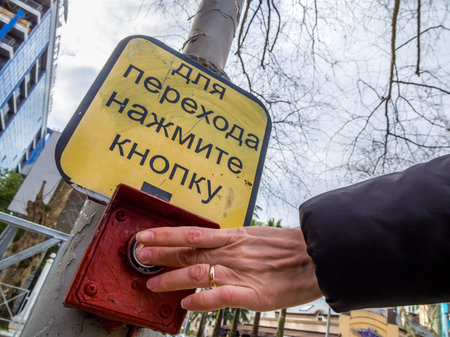 Turning on a green pedestrian traffic light using a button