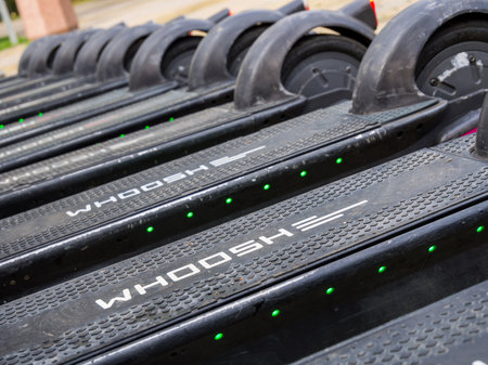 Sochi, Russia - February 23, 2023: Close-up of a row of electric scooters from the WHOOSH rental serviceのeditorial素材