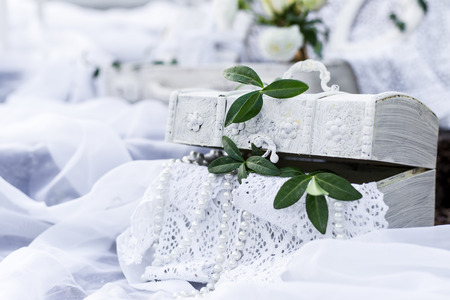 beautiful delicate items and interior decoration for home and decorating photo zone, frames, beads, bottles, bags and boxes, flowers, rosesの写真素材