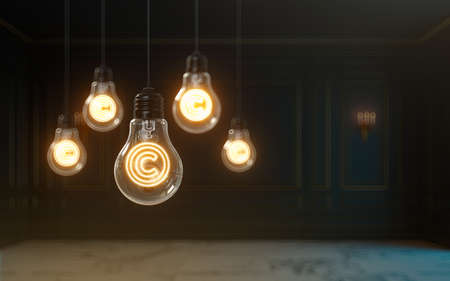 3d rendering copyright icon glow inside light bulb premium cover photo backgroundの写真素材