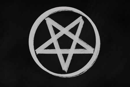 Pentagram icon chalk drawing on black chalkboardの写真素材