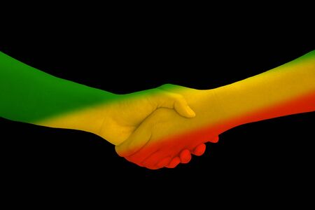 Green yellow red on human hand reggae background concept の写真素材