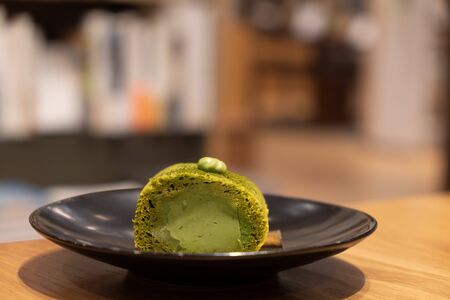 Matcha soft cake in coffee cafe の写真素材