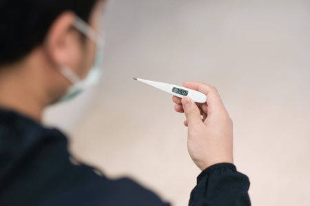 Men feel sick  measure body temperature and have a fever.
