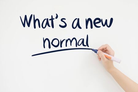 What is a new normal text on white boardの写真素材