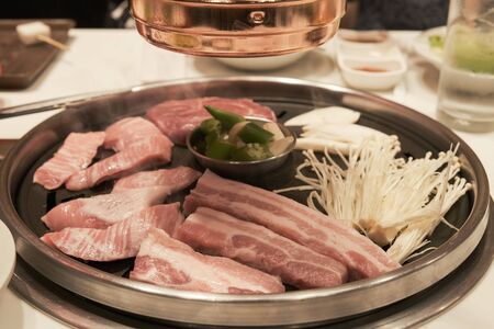 Korean pork BBQ style in Korean restaurant の写真素材