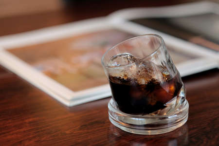 A glass of ice black coffee in coffee cafeの写真素材