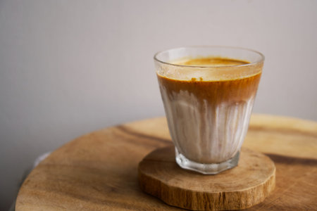 dirty coffee on a wooden dish, home cafÃ©