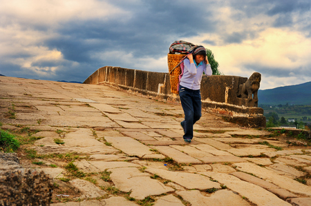 Villager crossing the Shaxi Yujin bridgeのeditorial素材