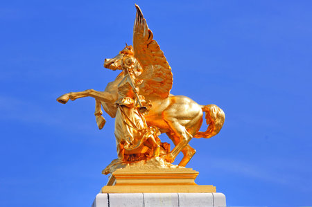 France, paris: Statues of Alexander III bridge; bronze and golden leaf statue; wing horse in movement の写真素材