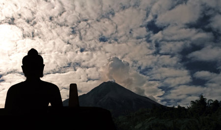 Indonesia, Java: Merapi  eruption, may 2006, and buddha in meditation 