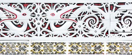 Indonesia, Sumatra: typical painting and carved decoration of houses in Indonesiaの写真素材