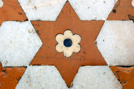 India, Agra: Taj Mahal; detail of the  mosque wall's decoration; white and red stone for a geometrical designの写真素材