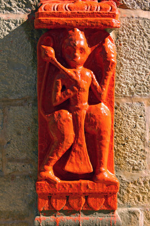 India, Rajasthan, Jaisalmer: statue in a jain temple; red color for a divinity の写真素材