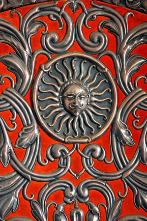 India, Jodhpur: symbol of maradja; red color with stylished curves  with a sun shinning in the middle ; political and social symbols の写真素材