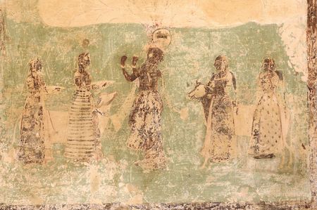 India, Jaipur: fresco on a wall; sandy colors  for this wall decoration with women in traditional dressの写真素材
