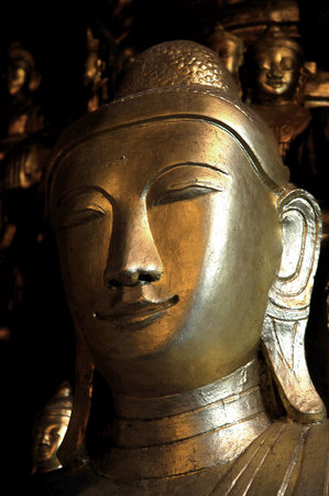 Myanmar, Pindaya: 8000 buddha's cave; golden color or golden leaf for these holy imagesの写真素材