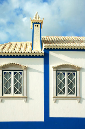 Portugal, Ericeira: Beach houses traditional   small white houses ; a typical view of this touristic destination の写真素材