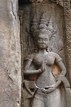 In Cambodia the Chau Say Tevoda in Angkor, few meters in front of the Thommanon temple, was a hindu temple built in the 12th century. The walls of the temple are carved with mythological figures  	の写真素材