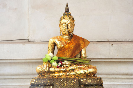 In Thailand the city of Ayutthaya was founded in 1350 today is an impressive archaeological park; here a view of a seated Buddha at the Phra Sri Sanphetの写真素材