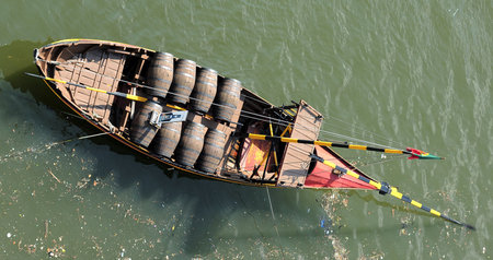 Portugal, Porto; view of one porto wine boat in the River Douroの写真素材