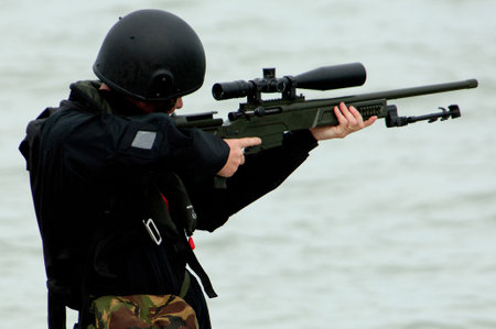 View of a sniper facing the sea 