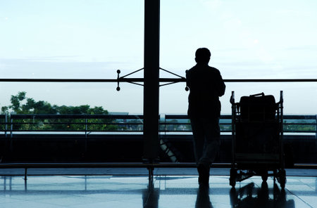 Airport, passenger waiting his flightの写真素材