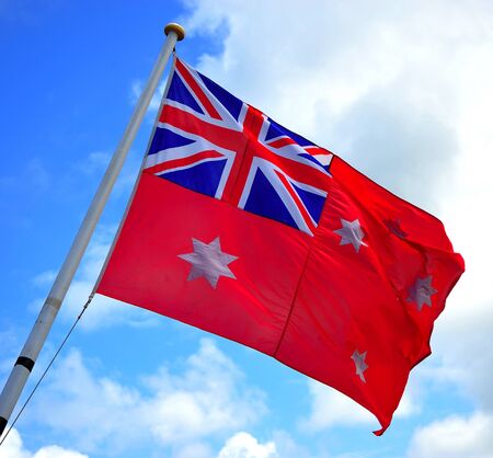 View of the Australian flag with blue sky during a summer dayの写真素材