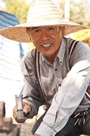 Thai construction worker in fieldの写真素材