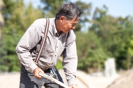 Thai construction worker in fieldの写真素材