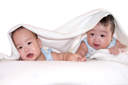 LIFESTYLE IMAGE-two lovely infants playing togetherの写真素材
