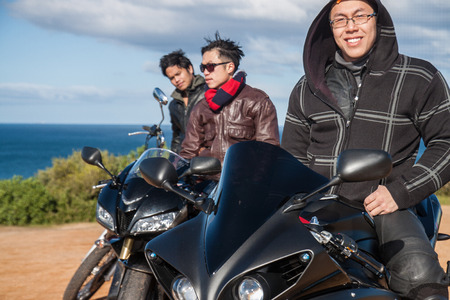 The motorcycle gang on the beachの写真素材