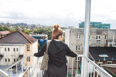 the girl on the balconyの写真素材