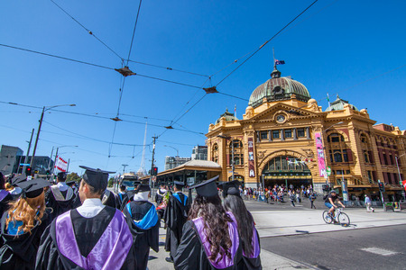 Melbourne, Australia - December 17, 2014 - RMIT university graduation day - the students walk along the Swanton St in Melbourne city for celebration day in graduation dayのeditorial素材