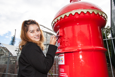 the girl with the post boxの写真素材