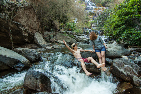 The lover at Mae Ya Waterwall, Inthanon National Park, Chiangmai, Thailandの写真素材