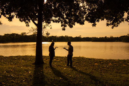 The lover in the bad situation at the parkの写真素材