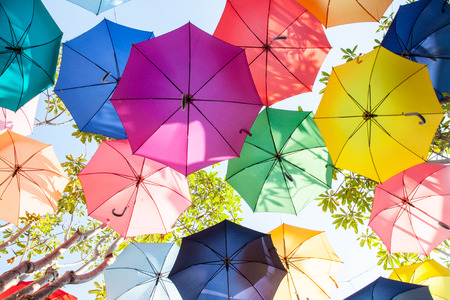 The colorful of umbrellas in the skies with sunny dayの写真素材