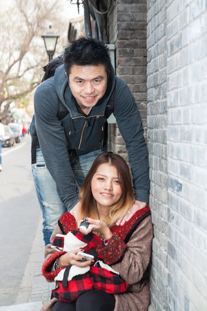 Thai lover travelers in Hutong, Beijing Chinaの写真素材