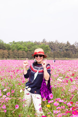 Thai women in the flower field. Thaialndの写真素材