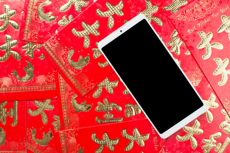 festive red envelope and mobile phoneの写真素材